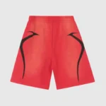 Introducing the Hellstar Warm Up Shorts 'Red': these shorts feature a vibrant red color with a striking black abstract design on each side set against a plain background. They're perfect for your pre-game routine or casual outings.