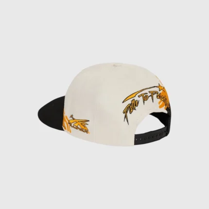 Hellstar Paintbrush Snapback Hat Yellow Black Key Features to Complete Your Look: Striking Paintbrush Design: The hat features a unique "paintbrush" style application of the Hellstar logo, giving it an authentic, hand-crafted feel. The bold yellow graphic pops against the classic black base for maximum visual impact. Classic Snapback Fit: Designed with a timeless snapback closure, this Hellstar cap offers a customizable, secure, and comfortable fit for all head sizes. Premium Quality Materials: Crafted from durable, high-quality fabric, this men's hat is built to last. The sturdy construction ensures the hat holds its shape, while the comfortable feel makes it ideal for all-day wear. Vibrant Colorway: The bold combination of yellow and black makes this a standout accessory. It's a versatile color pairing that can easily be styled with a wide range of outfits, from casual tees to hoodies. Statement Streetwear: More than just an accessory, this Hellstar apparel piece is a must-have for any enthusiast of cutting-edge streetwear. It's an essential element for completing your high-impact urban look.
