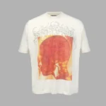 Hellstar Blood Scan T-Shirt Push the boundaries of modern streetwear with the Hellstar Blood Scan T-Shirt, an avant-garde piece that merges dark, dystopian imagery with high-end apparel engineering. Designed for those who favor a bold, rebellious aesthetic, this tee delivers an uncompromised visual punch that defines the cutting edge of contemporary urban fashion. Built with uncompromising attention to detail, the Blood Scan graphic offers an eerie, high-contrast narrative that instantly draws the eye. Whether you are using it to anchor a layered outfit or letting it stand alone as a statement piece, this t-shirt brings a gritty, high-concept edge to your daily rotation. Key Features Heavy-Duty Premium Cotton: Constructed from a dense, high-gauge cotton fabric that offers a substantial hand-feel, ensuring the garment maintains a structured, boxy drape instead of clinging. Intricate "Blood Scan" Graphic: Features high-definition, multi-tonal screen printing across the front and/or back. The specialized print technique captures intricate, skeletal-scan motifs with a weathered, distressed finish for an authentic vintage feel. Signature Oversized Silhouette: Tailored with a modern, relaxed fit featuring dropped shoulders and a wider torso, achieving that coveted architectural streetwear silhouette. Reinforced Ribbed Crewneck: Engineered with a thick, high-elasticity collar that resists stretching, sagging, and bunching, preserving a crisp neckline wash after wash. Pigment-Washed Treatment: Undergoes a specialized garment-dye and wash process, giving the fabric a soft, broken-in texture and a deep, multi-dimensional color tone right out of the package. Hellstar Blood Scan T-Shirt Front